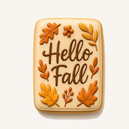 Hello Fall plaque cookie cutter shaped like a rectangle with rounded corners, designed to feature the words &quot;Hello Fall&quot; surrounded by autumn leaves and floral details. Ideal for seasonal baking and fall-themed cookie sets. Features a comfortable handle and sharp blade for precise dough cutting.