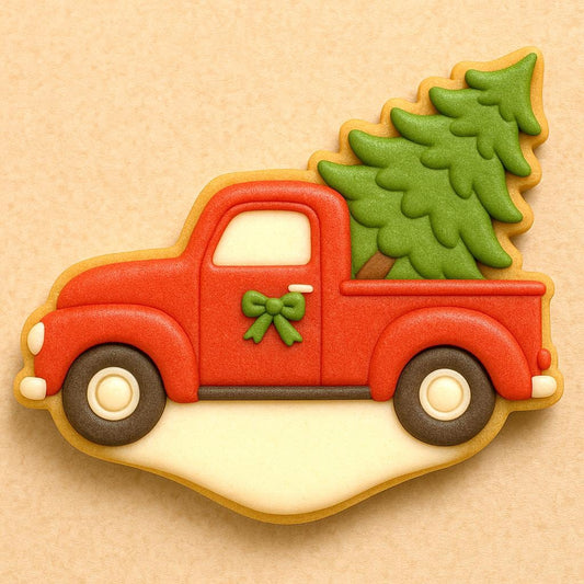 A cookie shaped like a red vintage pickup truck carrying a green Christmas tree in its bed, decorated with smooth royal icing and festive holiday details.