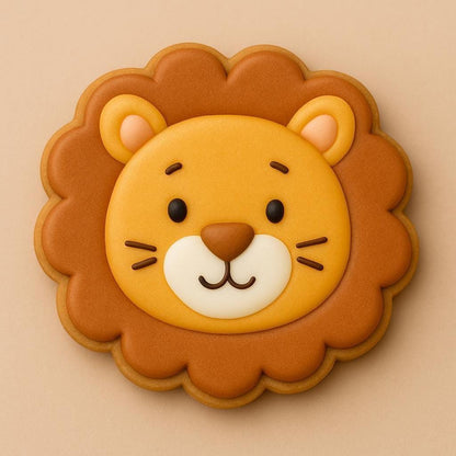 A sugar cookie shaped like a lion’s face with golden yellow icing, a brown mane, and a smiling expression on a beige background.