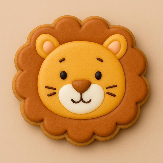 A sugar cookie shaped like a lion’s face with golden yellow icing, a brown mane, and a smiling expression on a beige background.