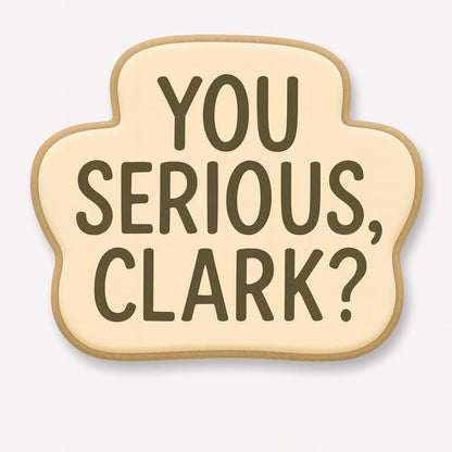 A set of decorated Christmas cookies inspired by the movie National Lampoon’s Christmas Vacation, including a car with a tree, moose mug, green trapper hat, Clark Griswold in a Santa suit tangled in lights, a roasted turkey, black cat with Christmas lights, “You Serious, Clark?” quote cookie, and an RV with a wreath.