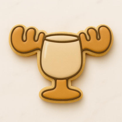 A set of decorated Christmas cookies inspired by the movie National Lampoon’s Christmas Vacation, including a car with a tree, moose mug, green trapper hat, Clark Griswold in a Santa suit tangled in lights, a roasted turkey, black cat with Christmas lights, “You Serious, Clark?” quote cookie, and an RV with a wreath.