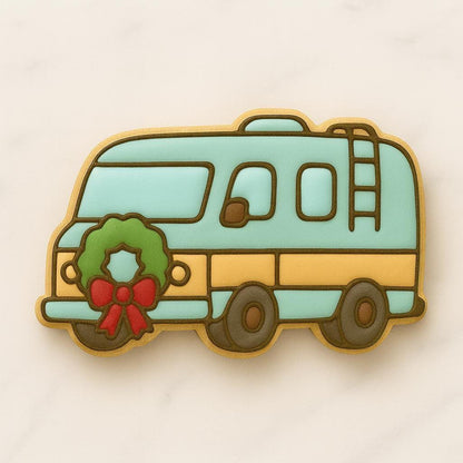 A set of decorated Christmas cookies inspired by the movie National Lampoon’s Christmas Vacation, including a car with a tree, moose mug, green trapper hat, Clark Griswold in a Santa suit tangled in lights, a roasted turkey, black cat with Christmas lights, “You Serious, Clark?” quote cookie, and an RV with a wreath.