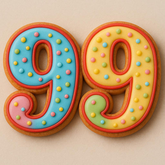 A sugar cookie shaped as the number 99, decorated in blue, yellow, pink, and green icing with colorful pastel sprinkles and red outline, placed on a beige background.